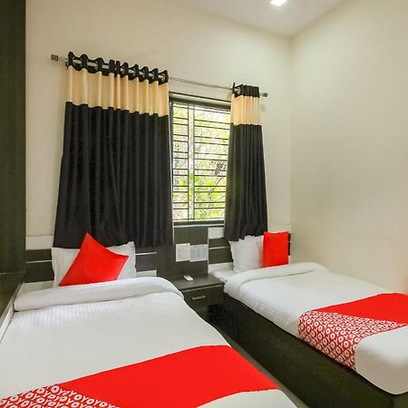 Hotel O Unique Inn Dhule Esterno foto